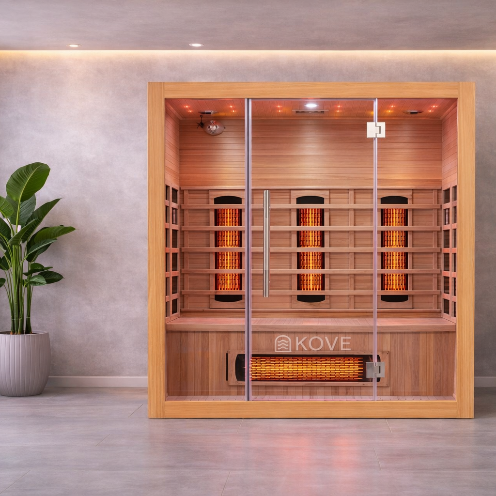 Infrared sauna with Kove branding in a room with a plant.